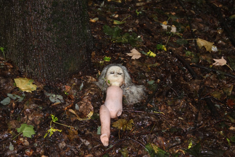A doll lays in the playground of the kindergarten